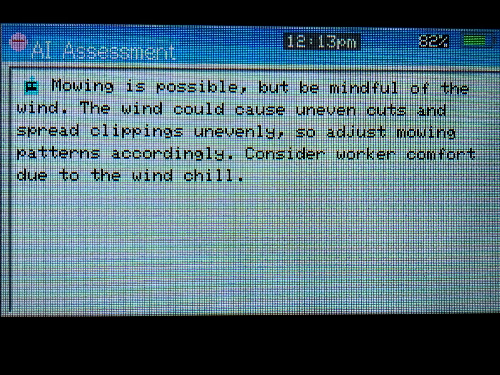 AI assessment screen with Google Gemini analysis providing contextual advice about mowing conditions and wind considerations
